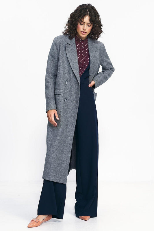 Oversized double-breasted grey coat with long sleeves and button details, side view