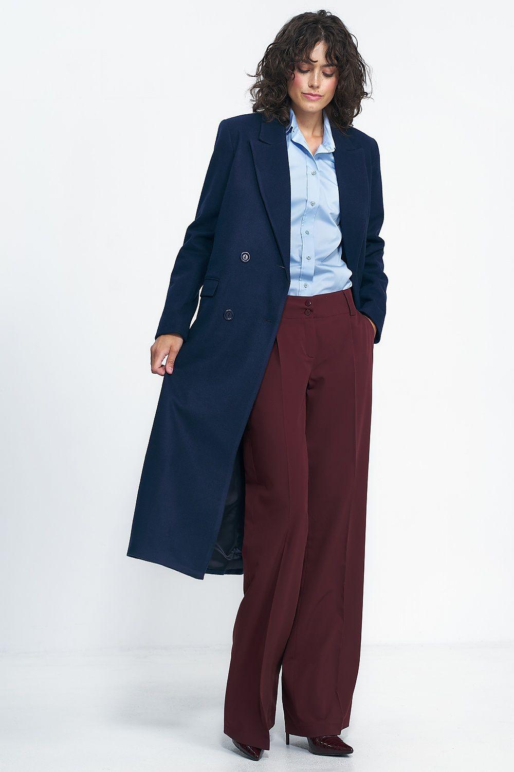Oversize navy double-breasted coat with button front and notched lapels, draped fit