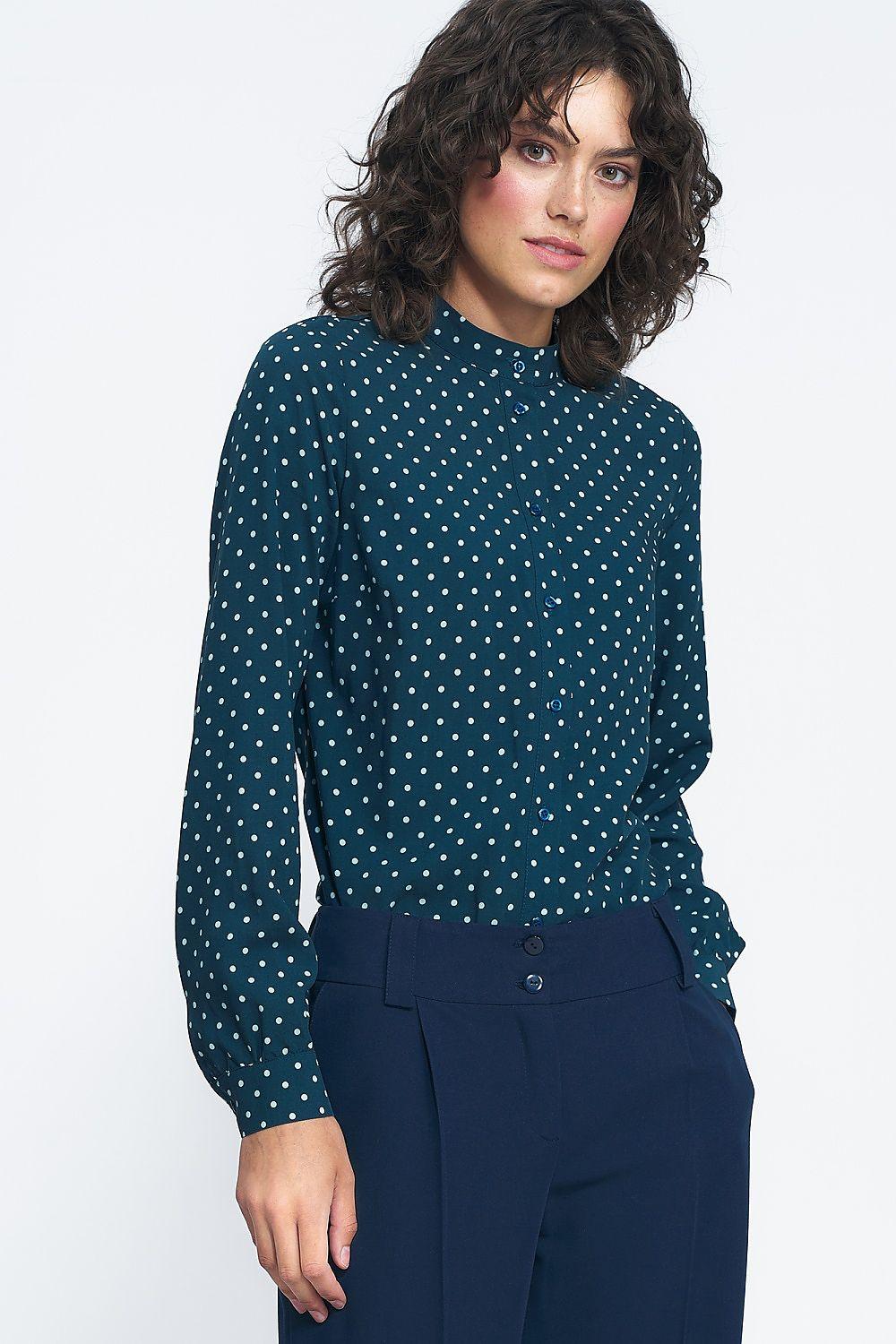 Long-sleeve polka dot shirt in dark green with white dots, buttoned front and cuffs