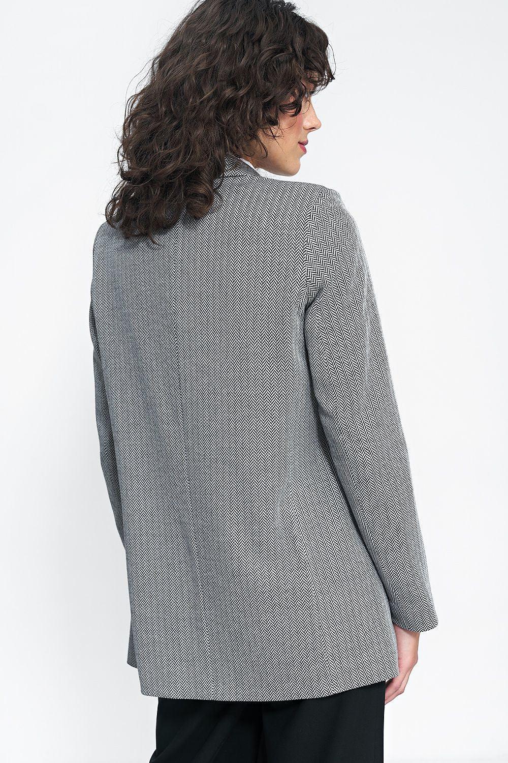 Women's gray patterned blazer jacket back view with long sleeves