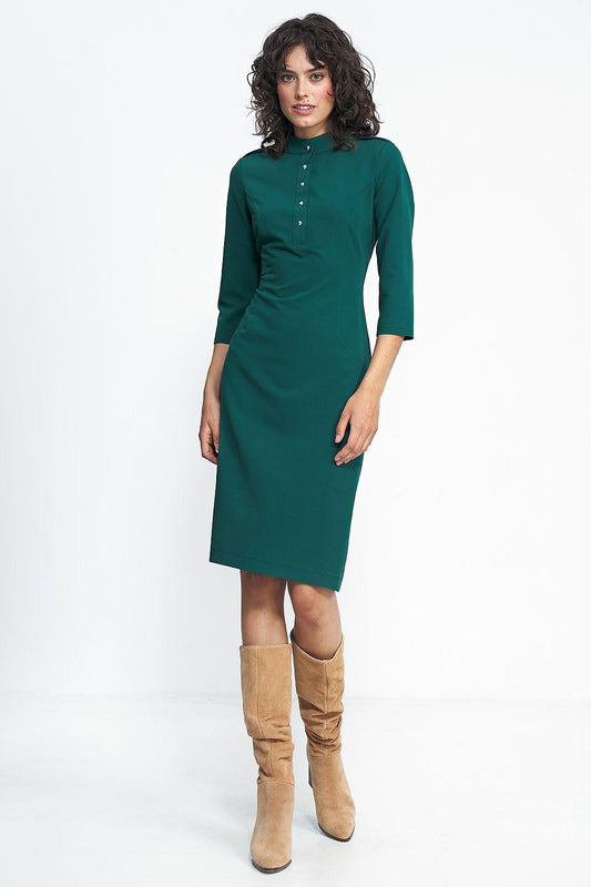 Nife green fitted day dress, 3/4 sleeves, buttoned front and mock neckline