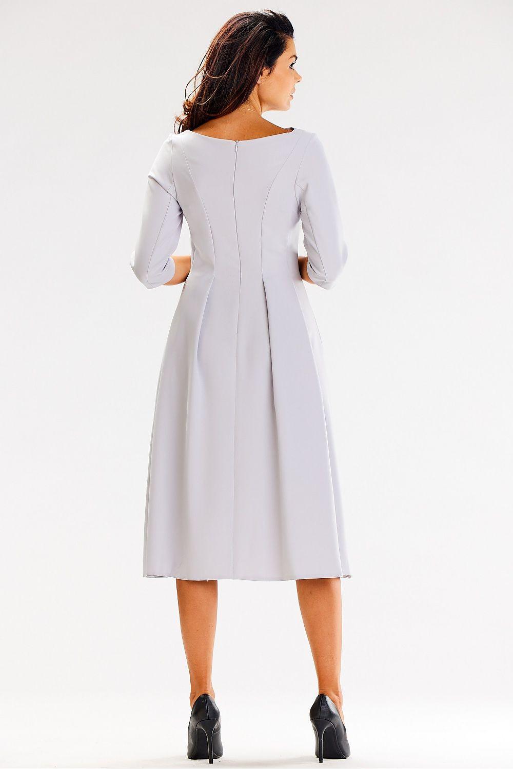 Light grey A-line daydress with 3/4 sleeves and center-back seam