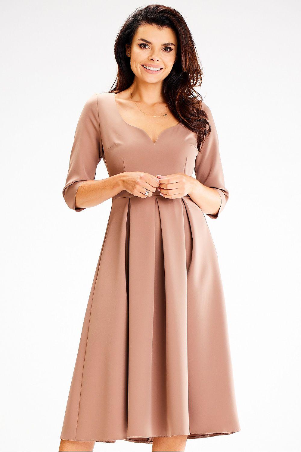 Beige V-neck day dress with three-quarter sleeves and gathered skirt