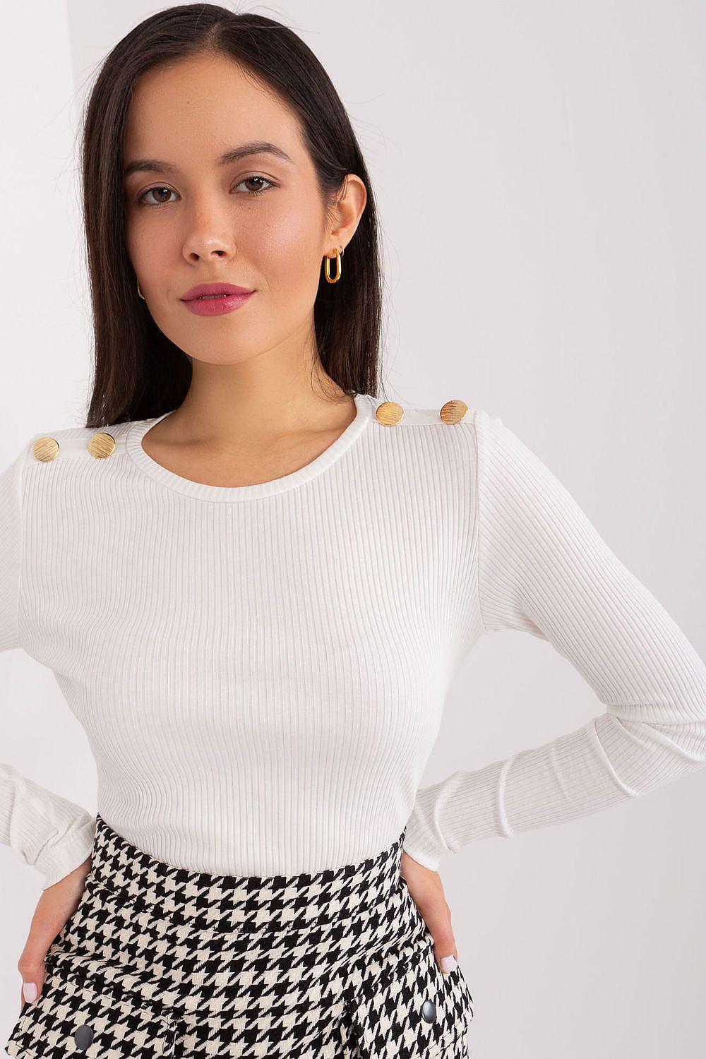 Beige blouse with decorative shoulder buttons, long sleeves and round neckline