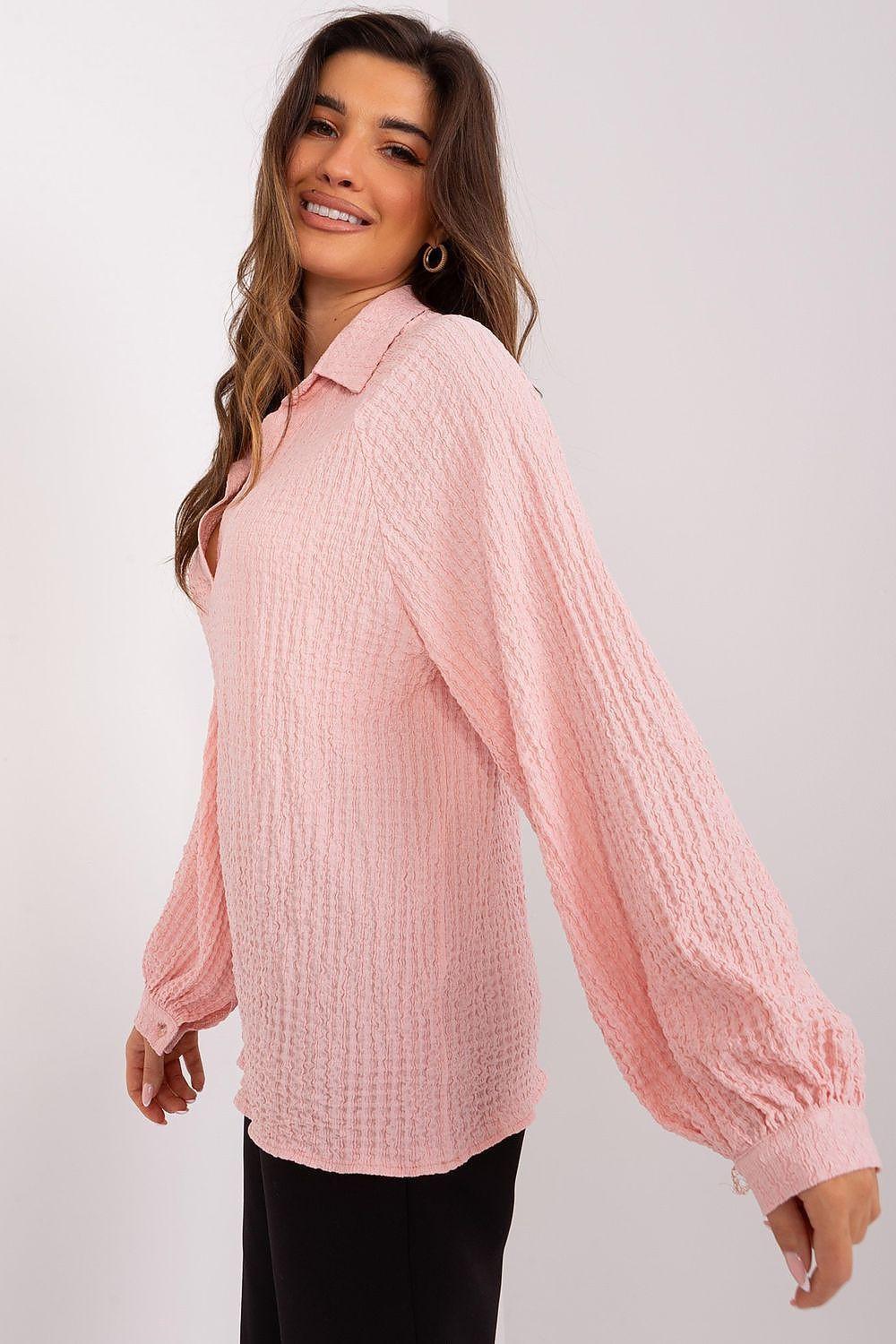 Pink textured long-sleeve blouse with collar and button front