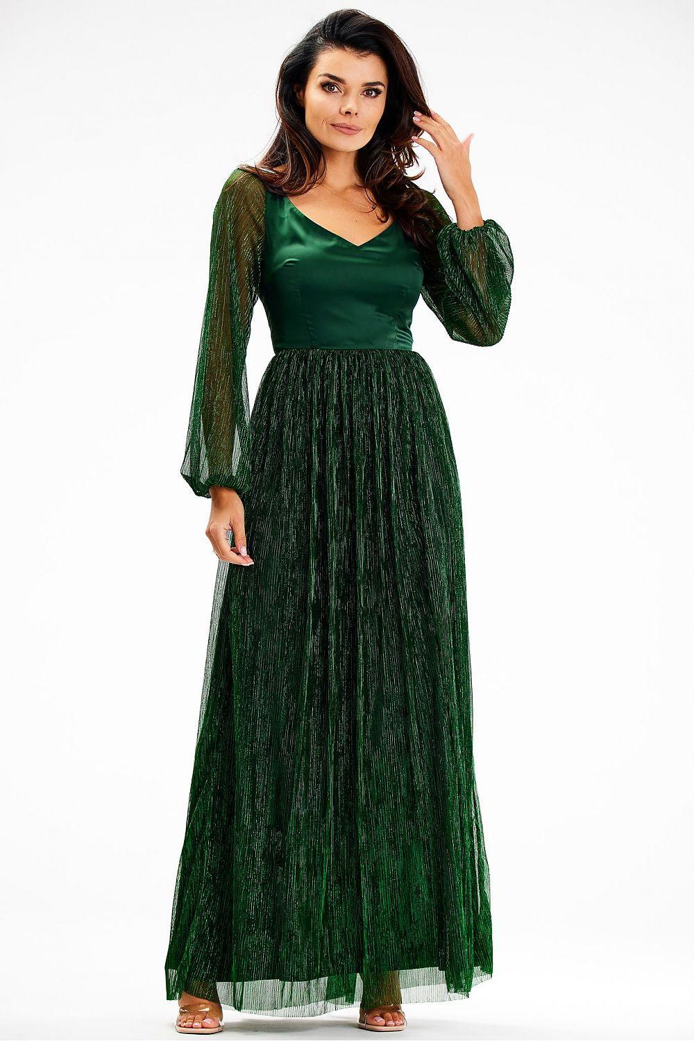 Long green maxi dress with V-neck bodice, sheer sleeves, pleated skirt.