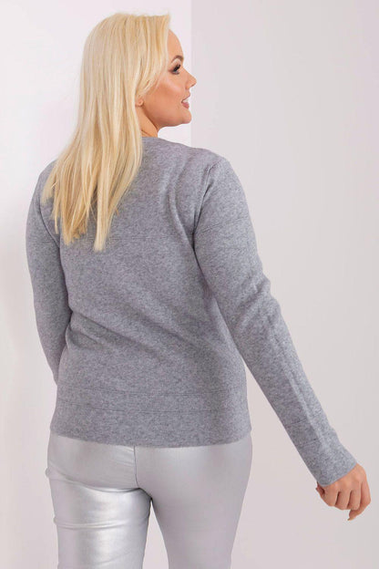 Grey plus size jumper back view with long sleeves and small pom-pom detail