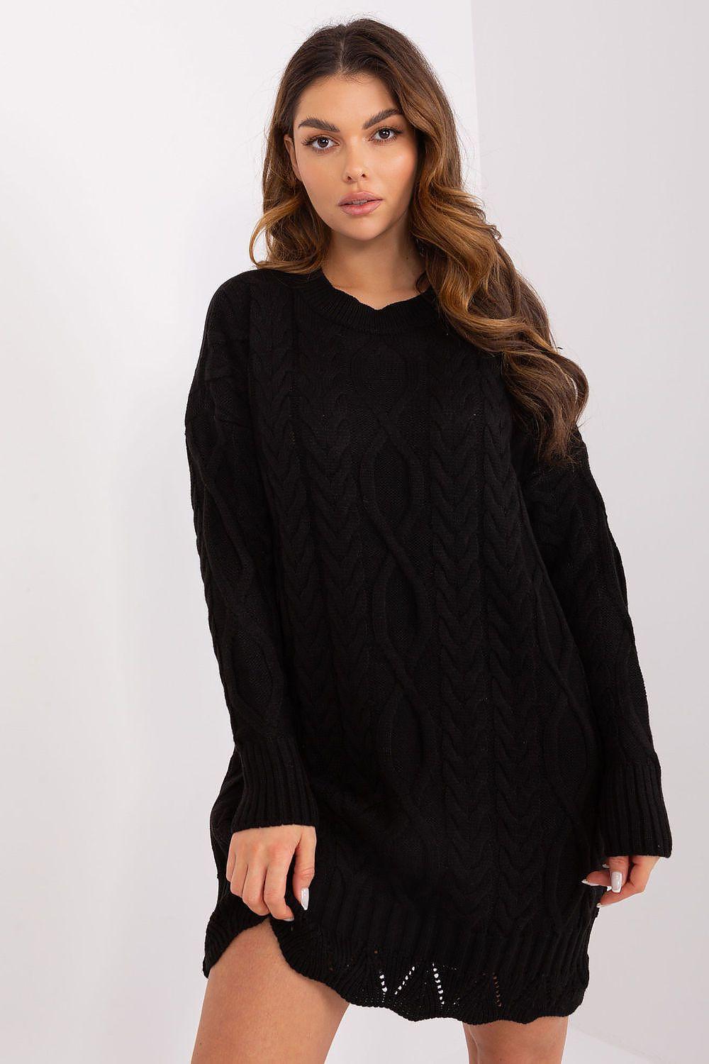 Black knit daydress with long sleeves and cable pattern, short hemline
