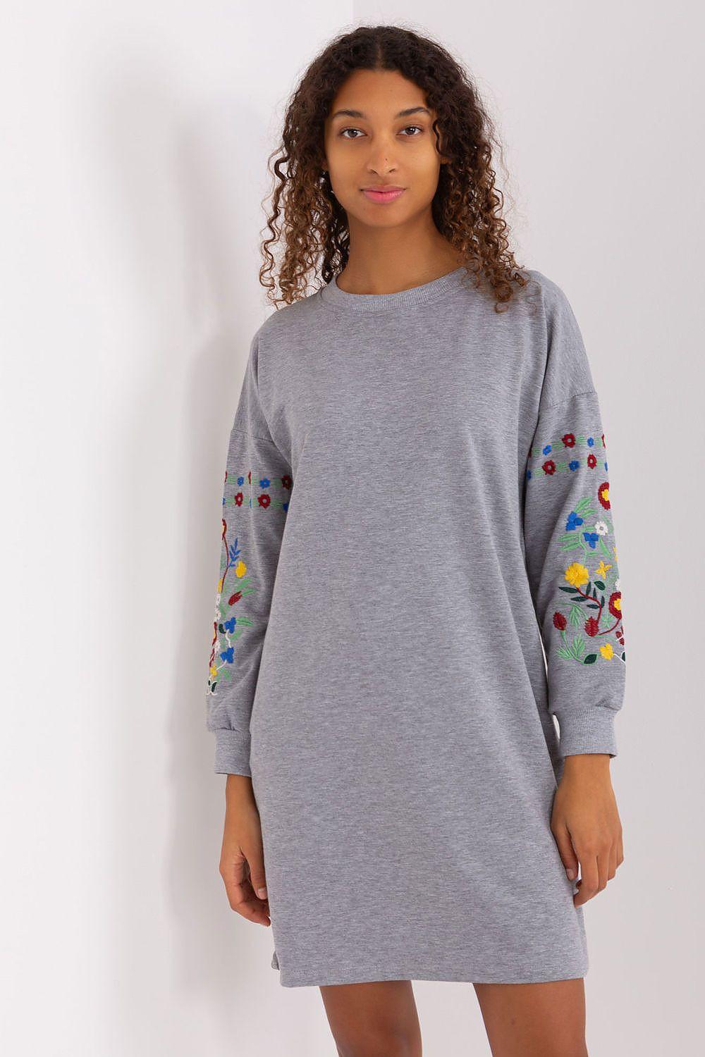 Grey daydress with 3/4 sleeves and colorful floral embroidery on cuffs