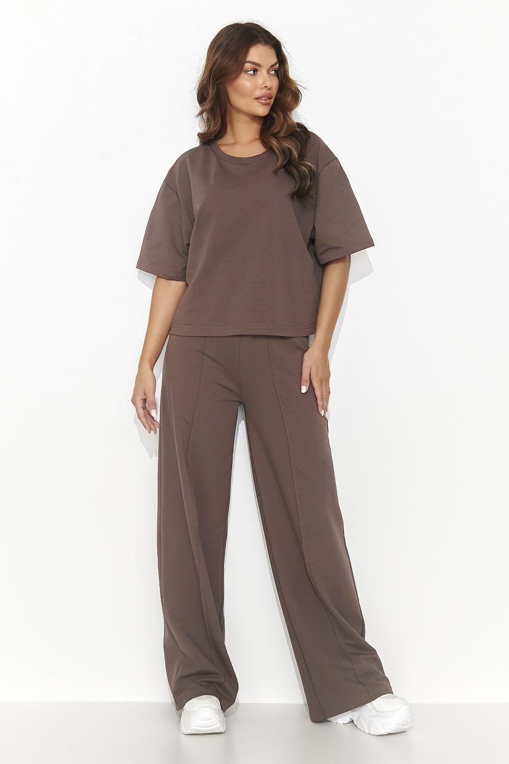 Numinou tracksuit set with brown wide-leg pants and short-sleeve cutout top