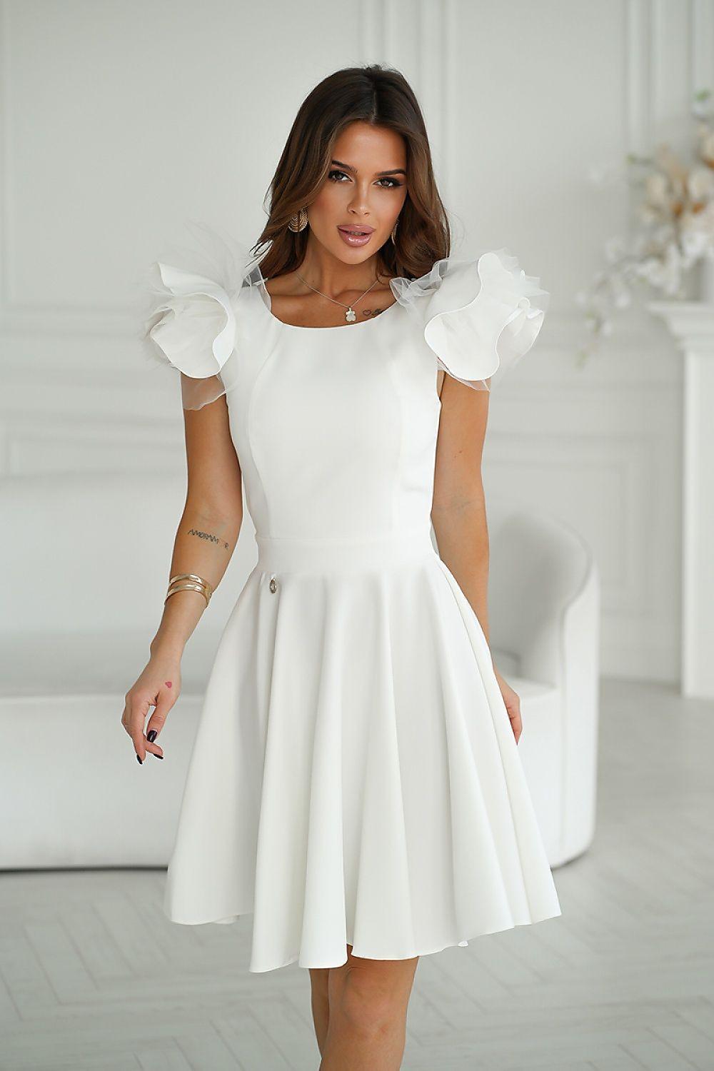 White cocktail dress with puff sleeves and a pleated flared skirt