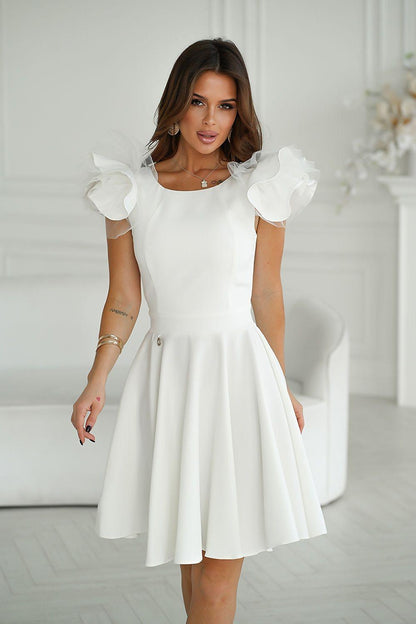 White cocktail dress with puff sleeves and a pleated flared skirt