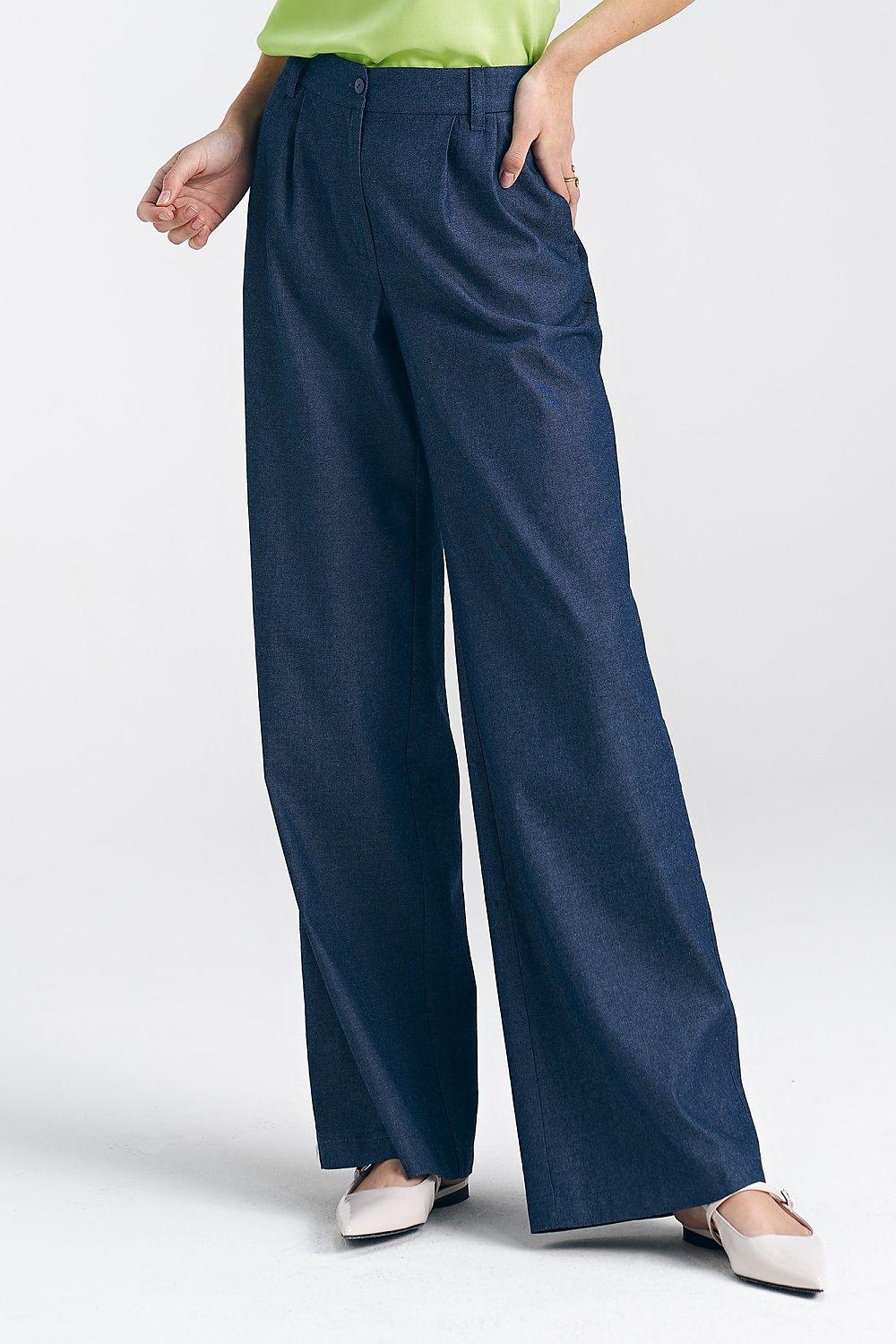 High-waist wide-leg trousers in dark navy blue, front crease and side pockets.