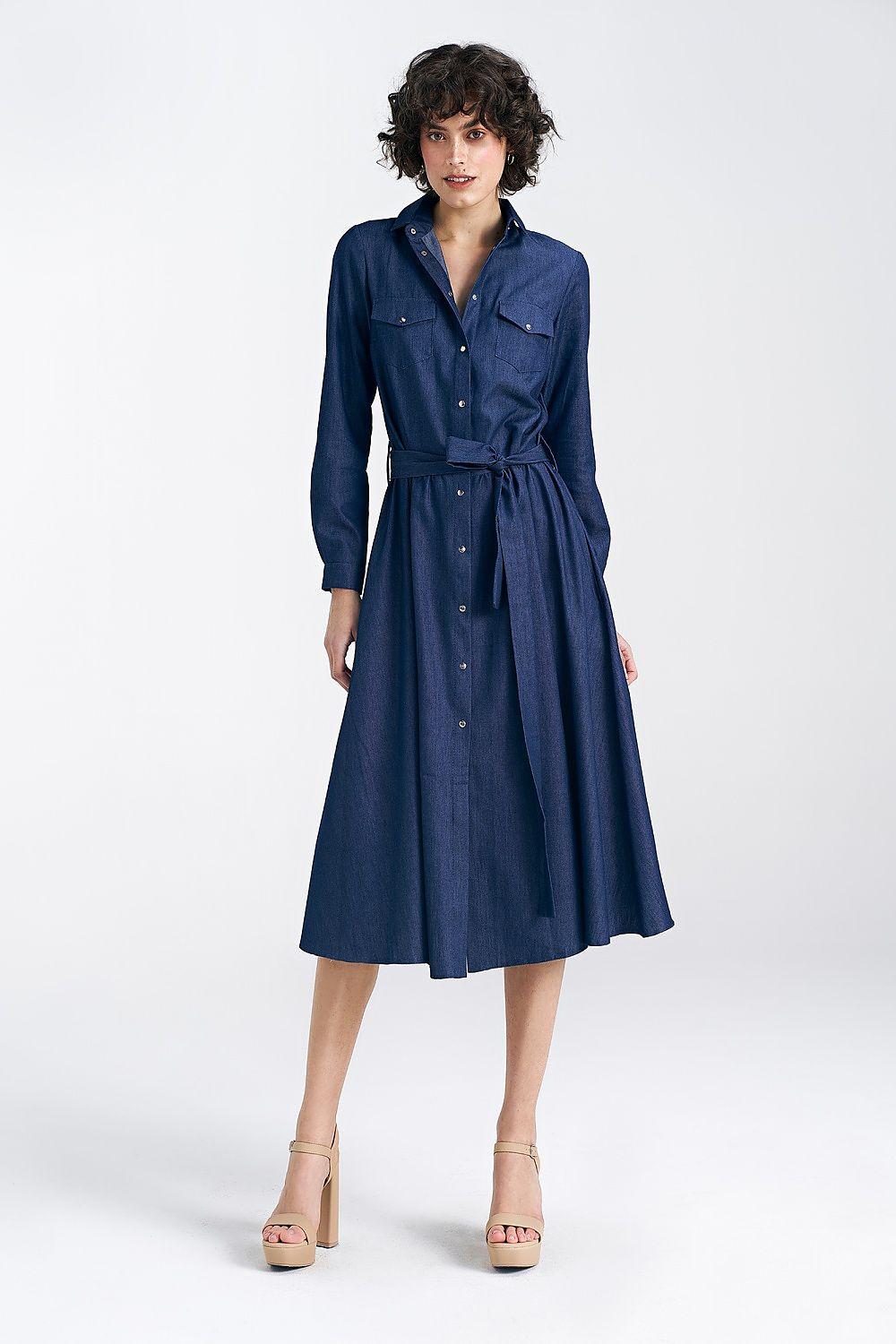 Navy blue button-down daydress with collar, long sleeves and waist tie, midi length.
