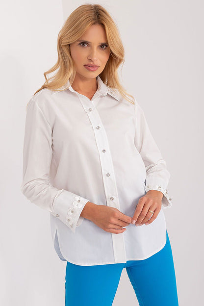White long-sleeve cotton shirt with button-front, pointed collar, and embellished cuffs