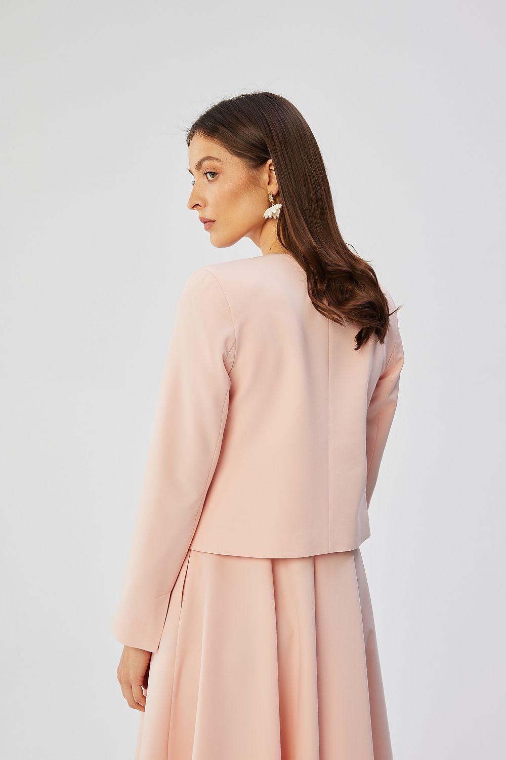 Blush pink collarless short jacket, long sleeves, back view