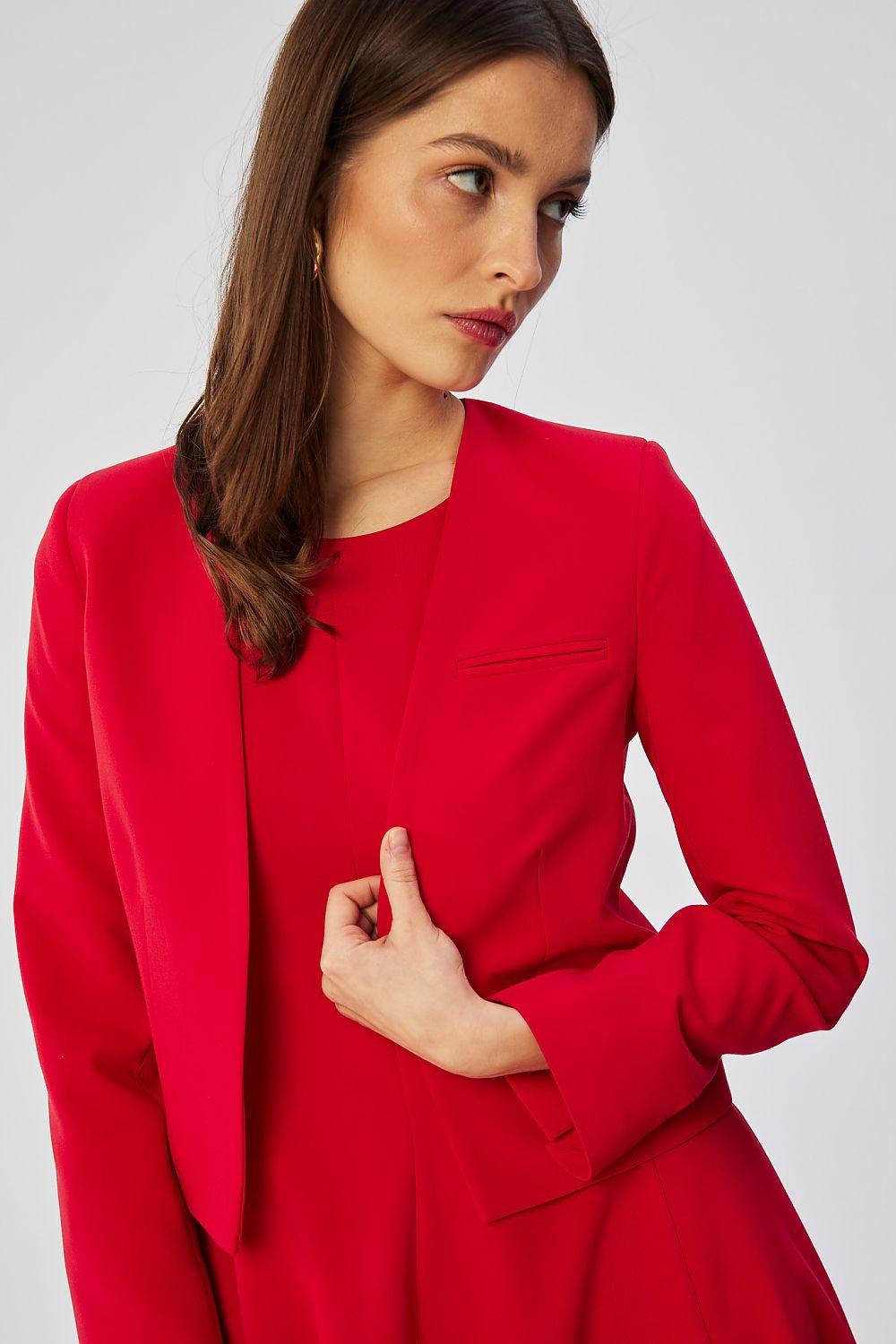 Red collarless short jacket with long sleeves and front pocket detail