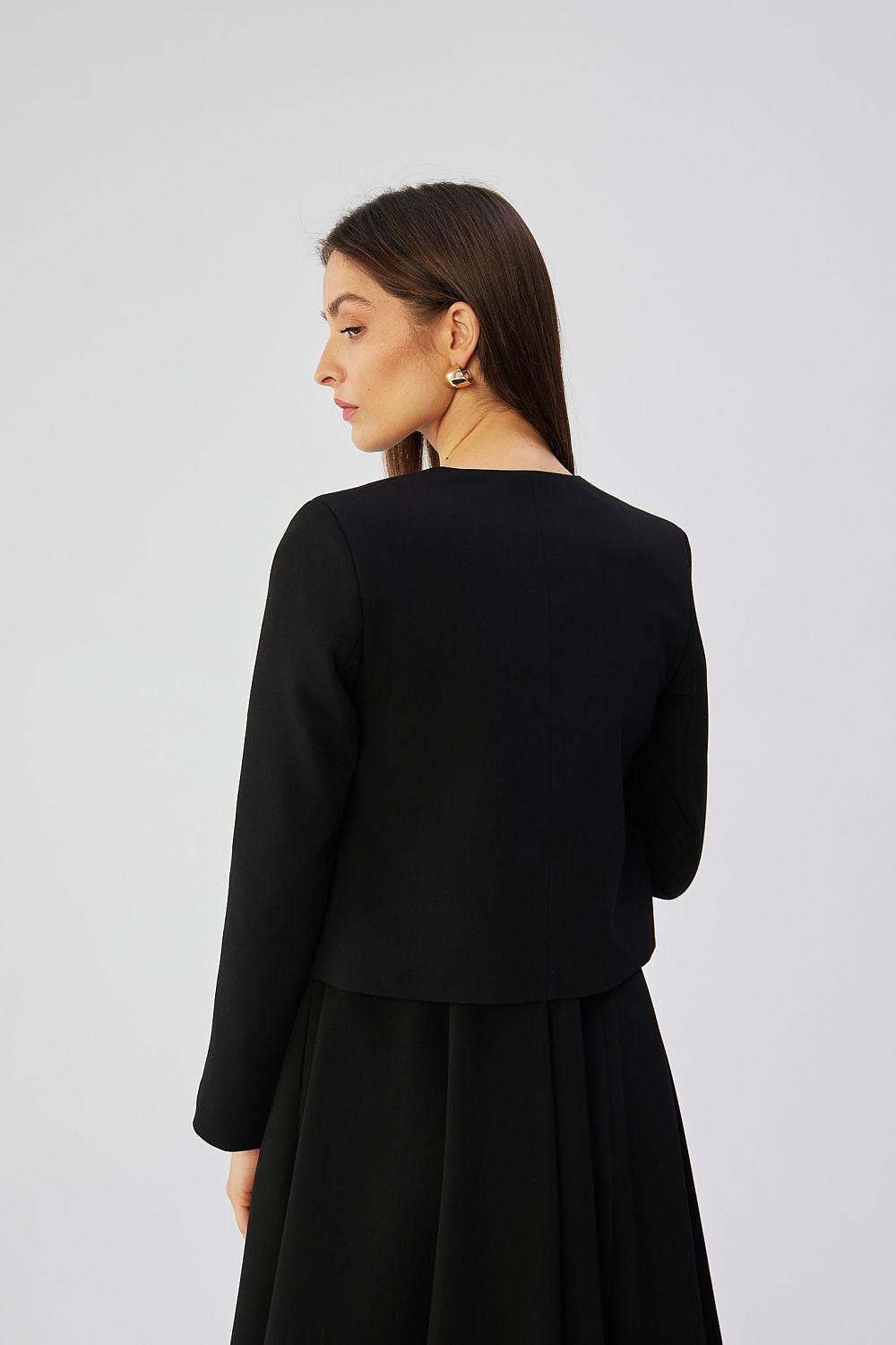 Black collarless short jacket back view with 3/4 sleeves and seam detail