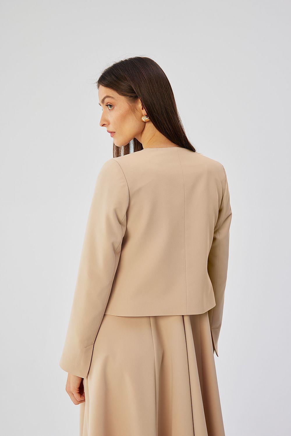 Beige collarless short jacket, long sleeves, cropped back