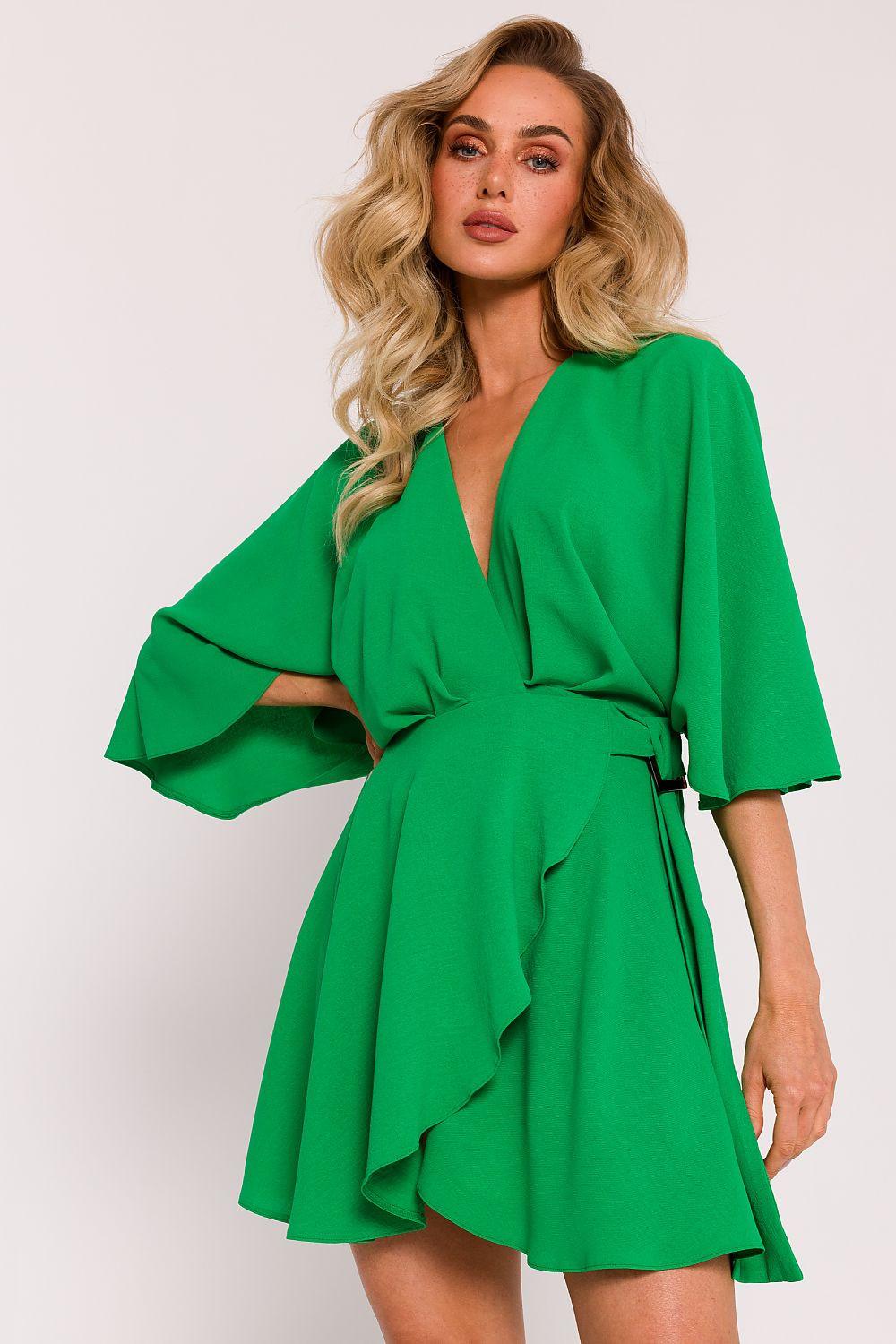 Green V-neck ruffle daydress with wide sleeves and layered, wrap-style skirt