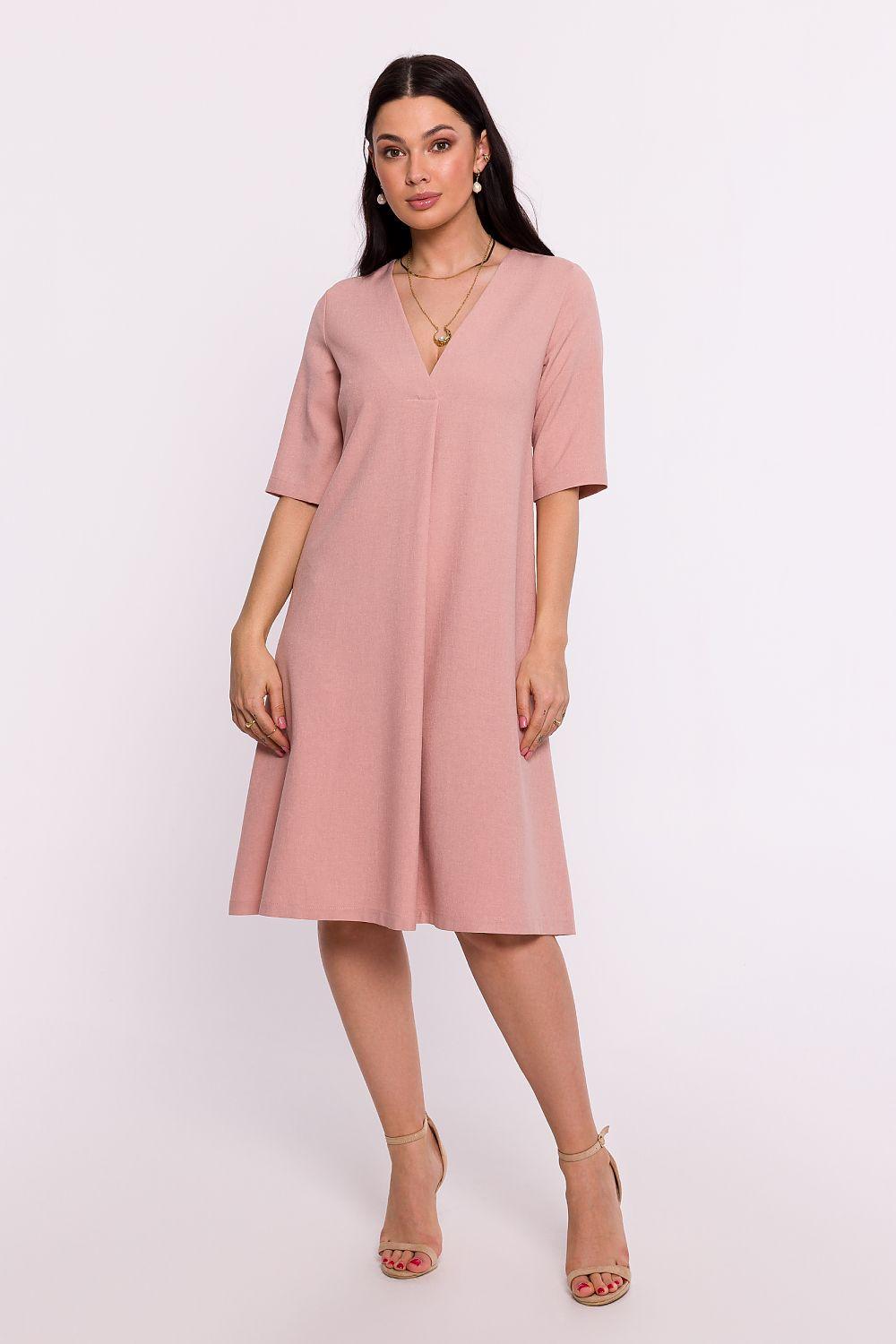V-neck daydress in dusty pink with short sleeves and knee-length A-line skirt