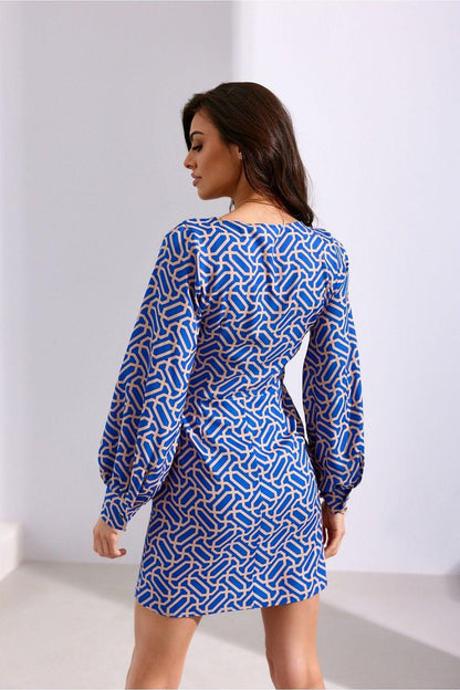 Blue patterned cocktail dress back view with V-neck and balloon sleeves