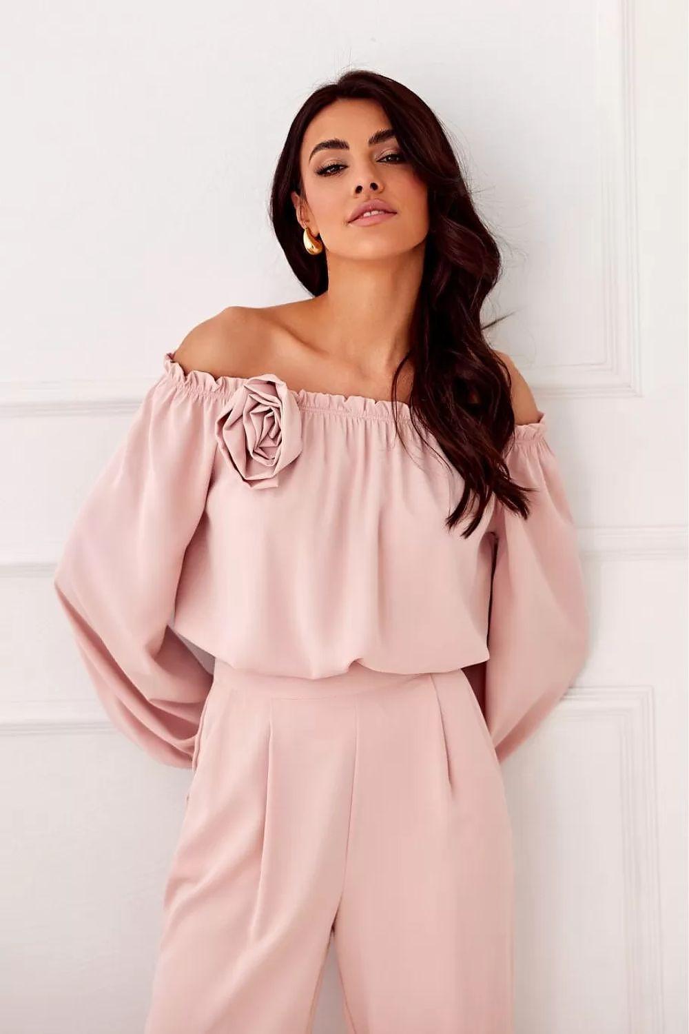 Light pink off-shoulder satin blouse with rose accent