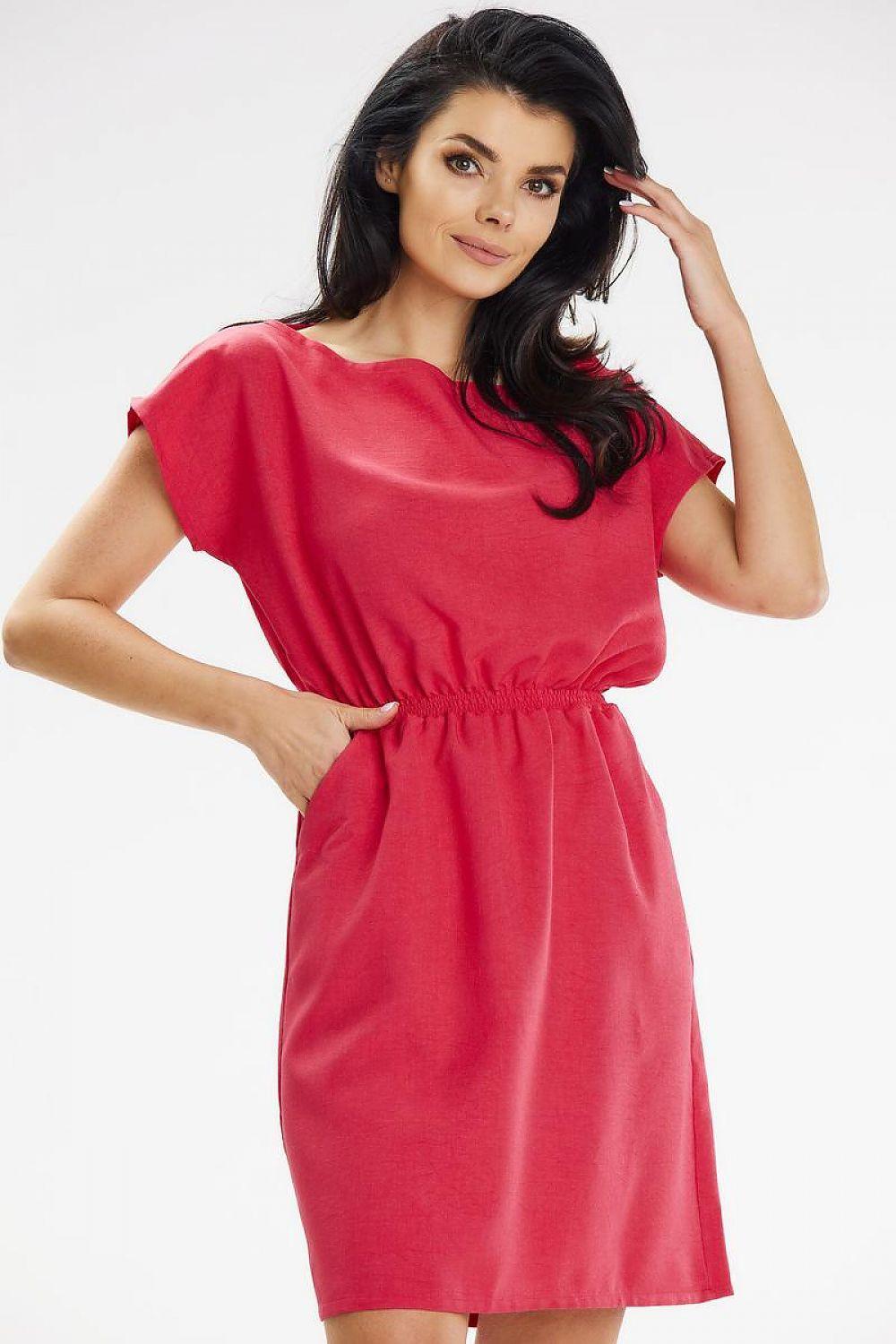 Red daydress with short sleeves and gathered waist, straight knee-length skirt.
