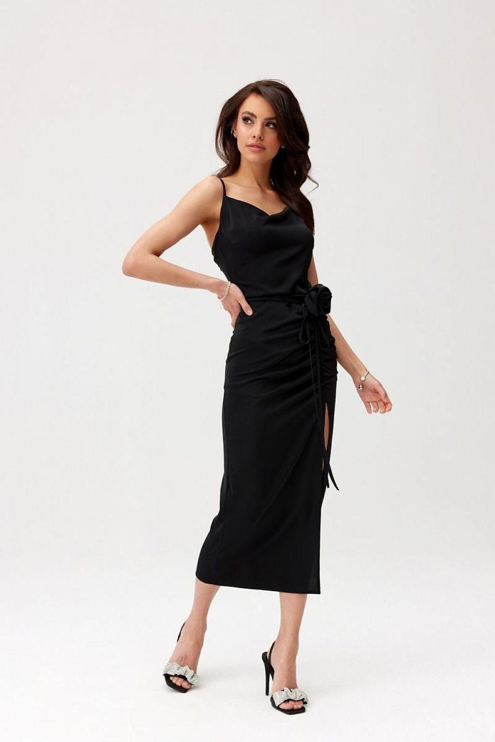 Black midi cocktail dress with ruched waist and side slit, tied detail at hip