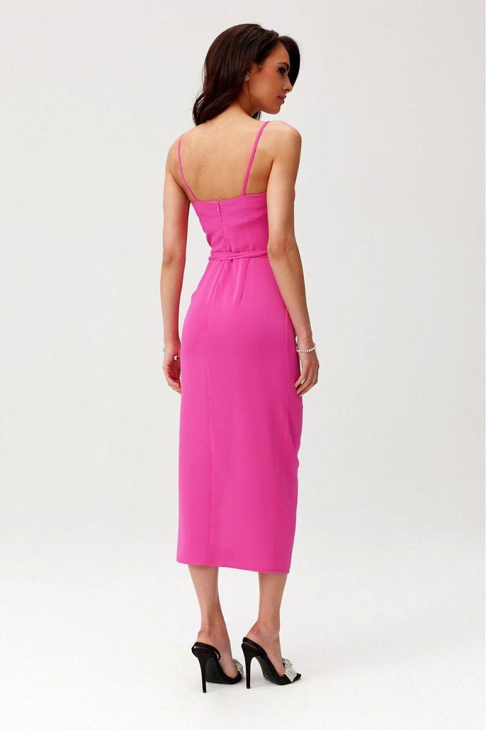 Back view of sleeveless midi cocktail dress in bright pink with scooped back and front slit