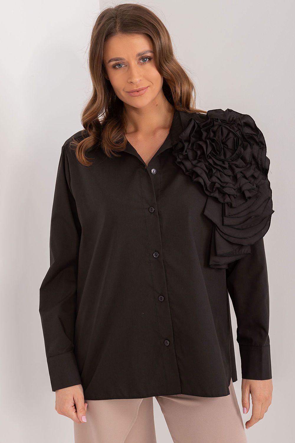 Black long-sleeve button-up shirt with oversized layered ruffle shoulder detail