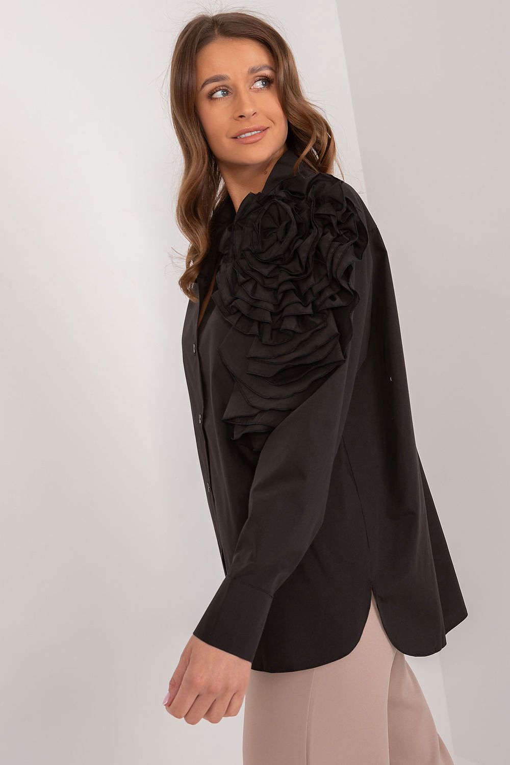Black long-sleeve button-up shirt with layered ruffle shoulder accent and collar