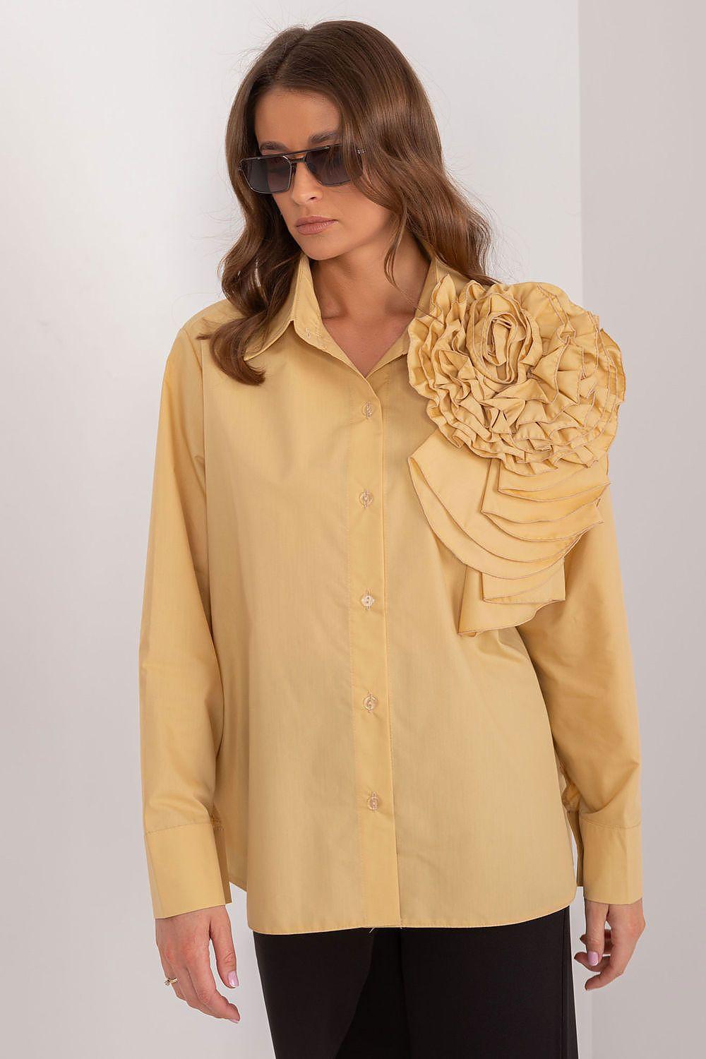 Yellow long-sleeve button-up shirt with ruffled shoulder detail
