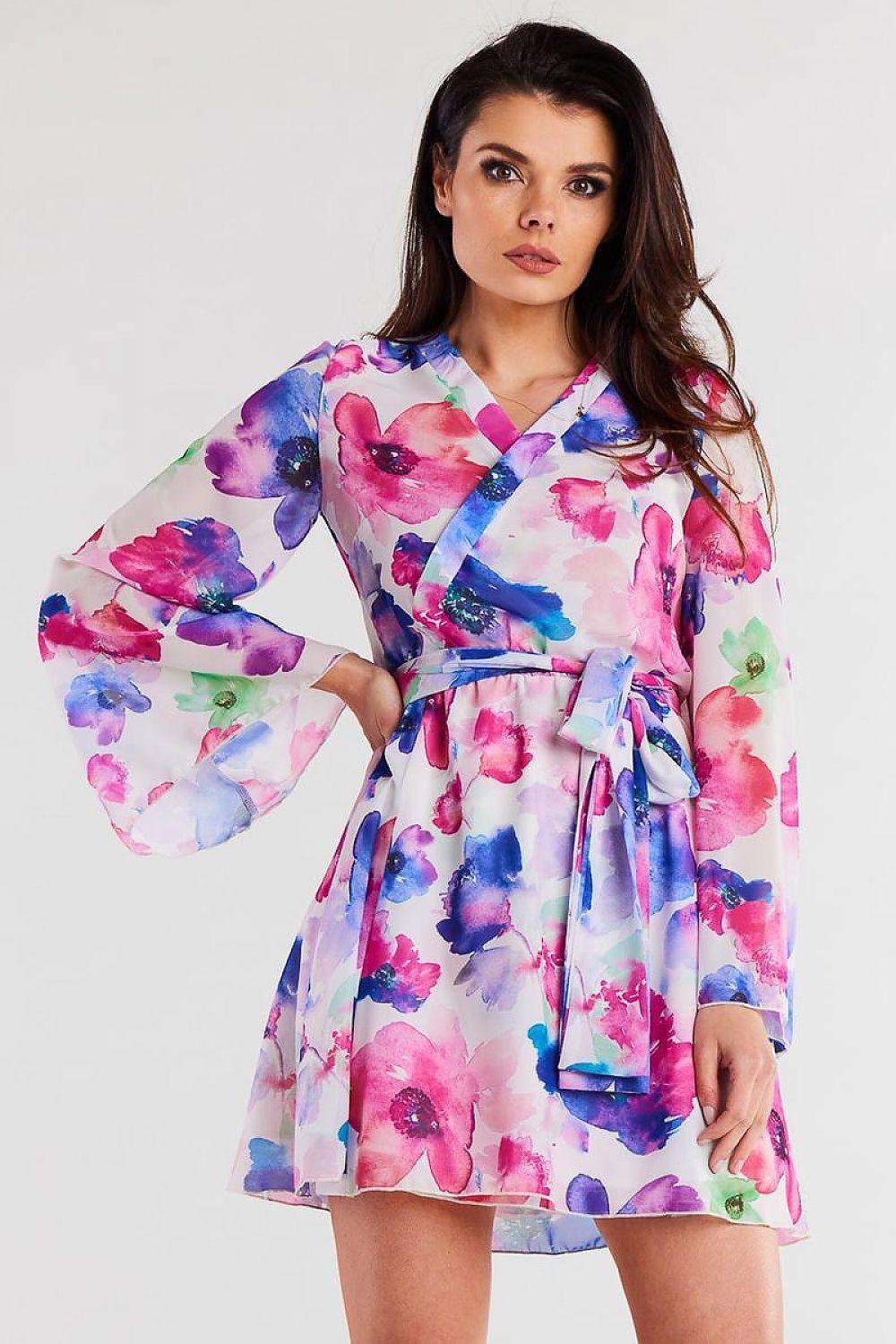 Floral daydress with V-neck, long bell sleeves, and tie waist belt, multicolor print.