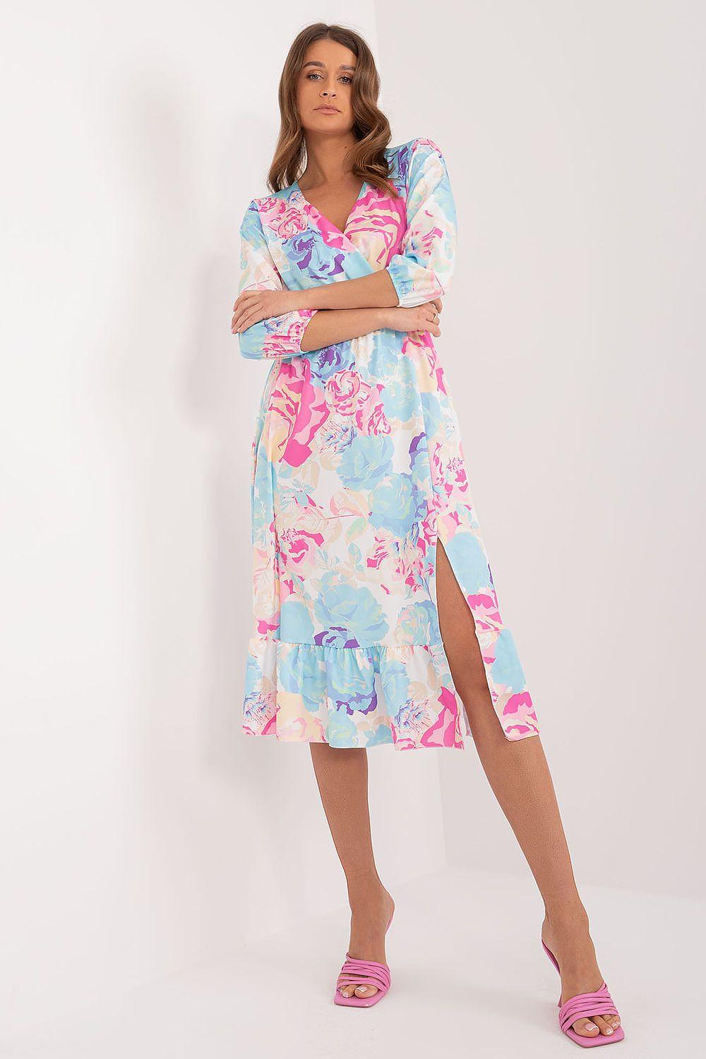 Light blue and pink patterned daydress with ruffled hem and side slit