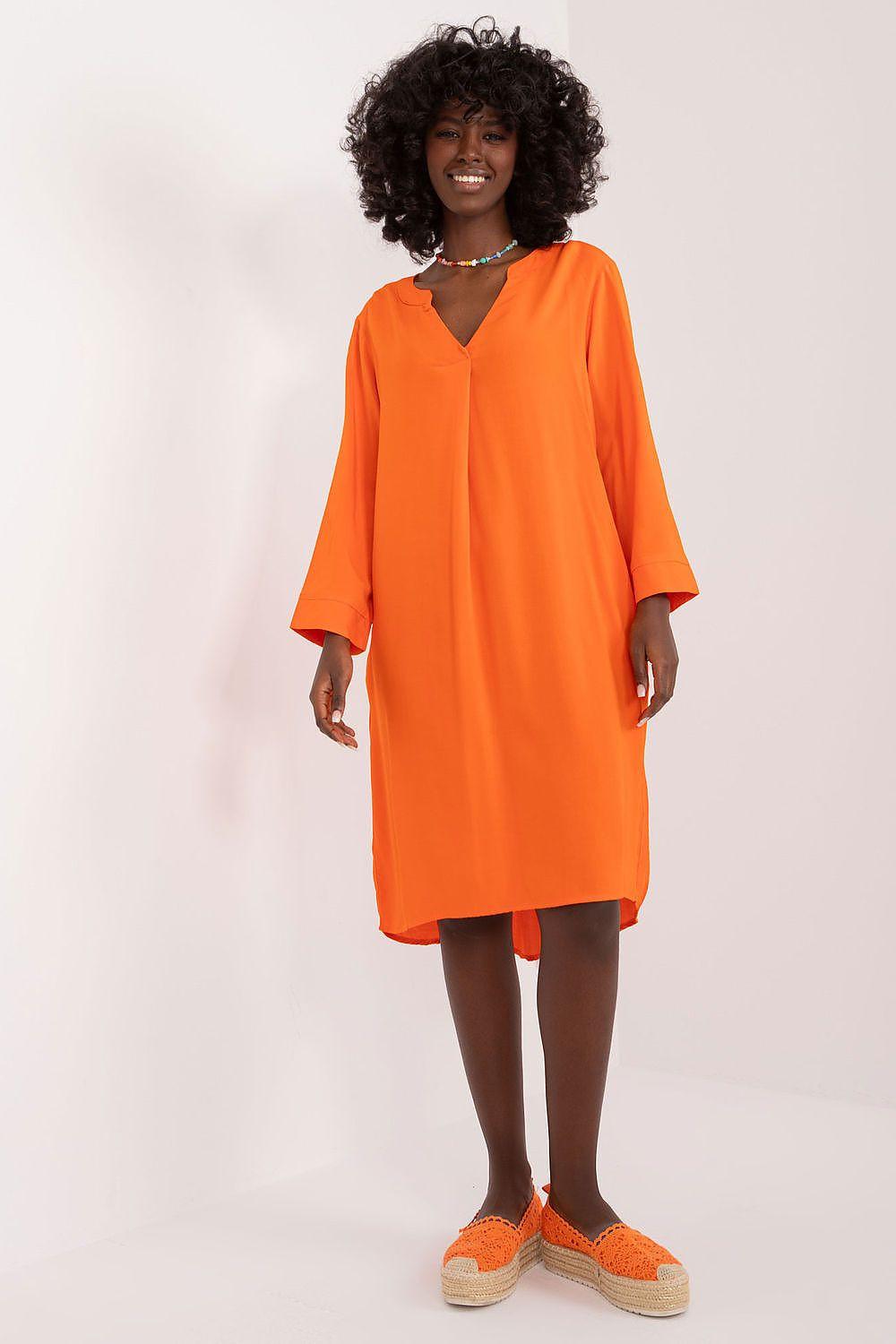 Orange V-neck daydress with elbow-length sleeves and side slit hem