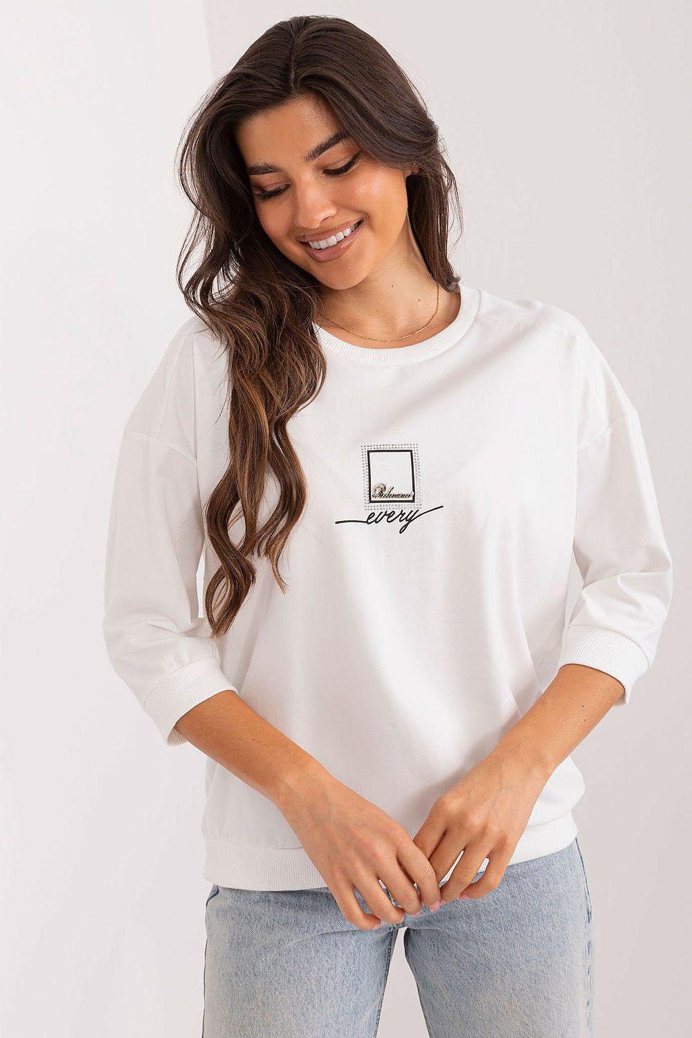 White blouse, 3/4 sleeves, crew neck, small front logo patch