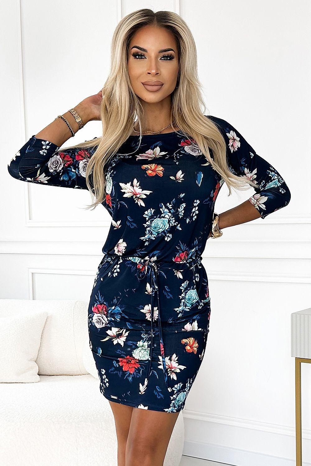 Navy floral daydress with long sleeves and fitted waist, knee-length