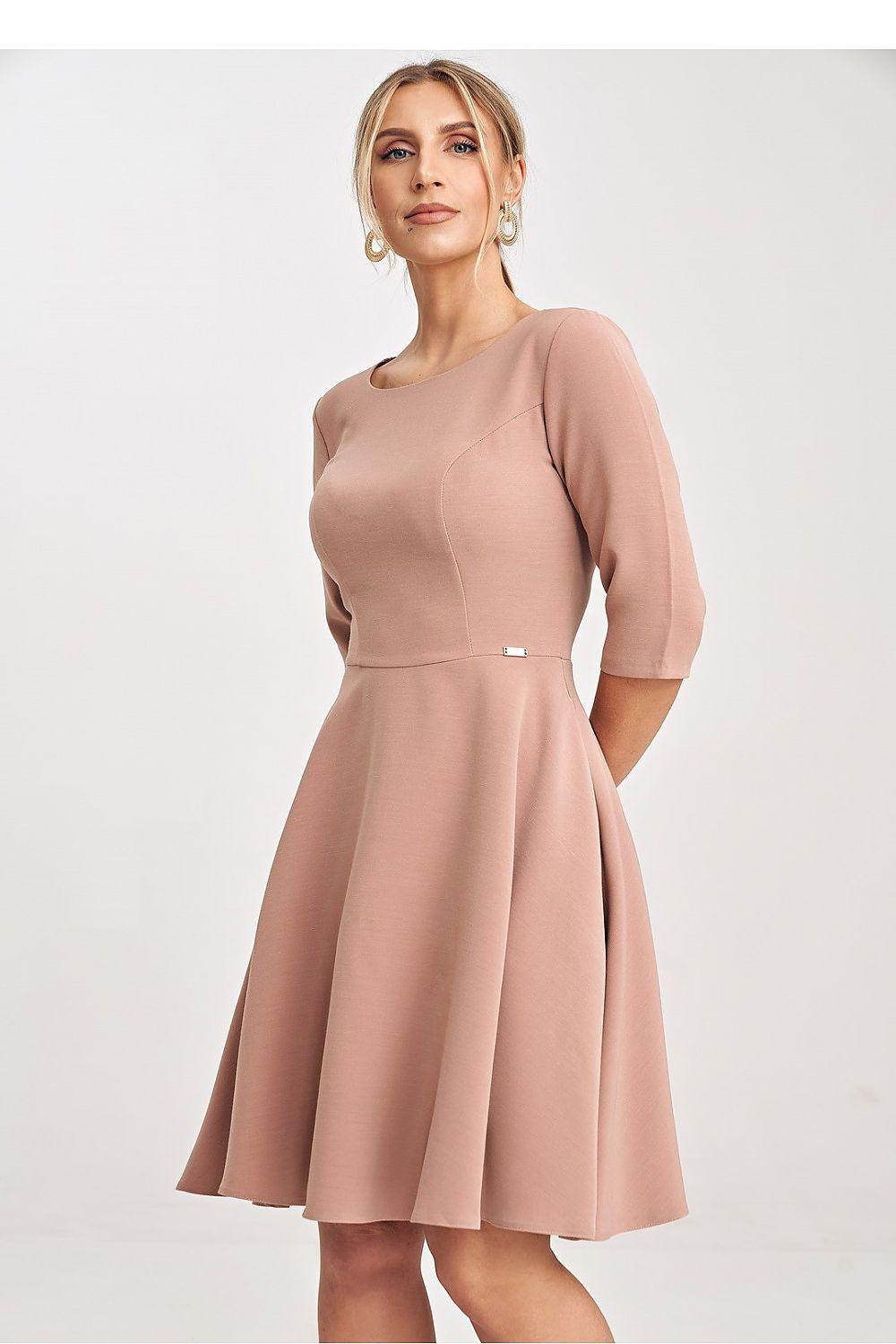 Pink short-sleeve daydress with fitted bodice and flared skirt