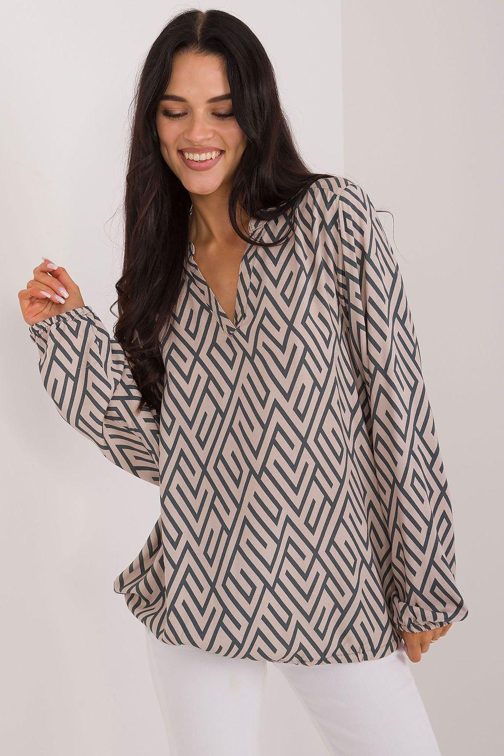 Beige patterned blouse with V-neck and long sleeves, loose fit