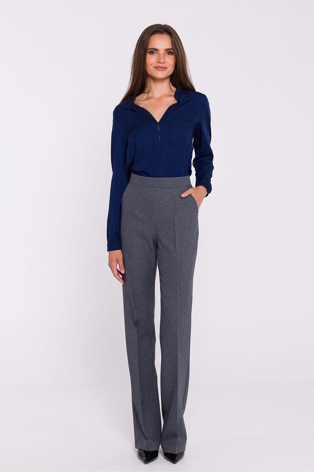 Women’s high-waist grey wide-leg trousers with belt loops and side pockets.