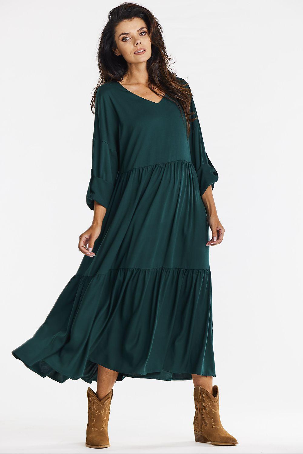Green V-neck tiered daydress with three-quarter sleeves, gathered waist, midi length.