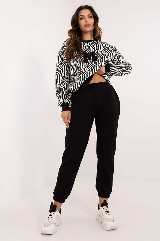 Zebra-print hoodie and black jogger pants set with ribbed cuffs