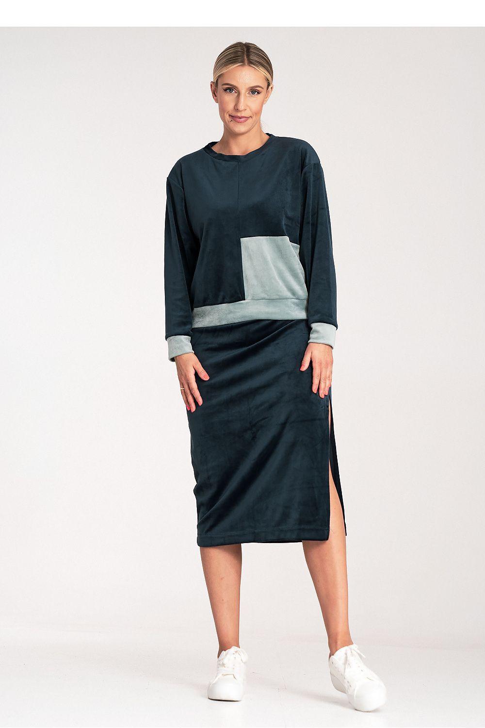 Navy blue long-sleeve set with midi skirt, light chest color-block panel.