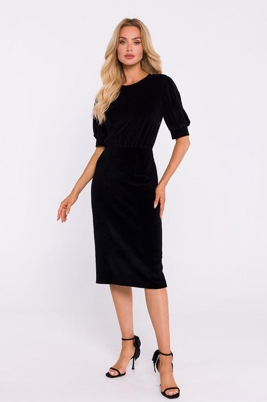 Black velvet midi daydress with puff sleeves and gathered waist, round neckline.