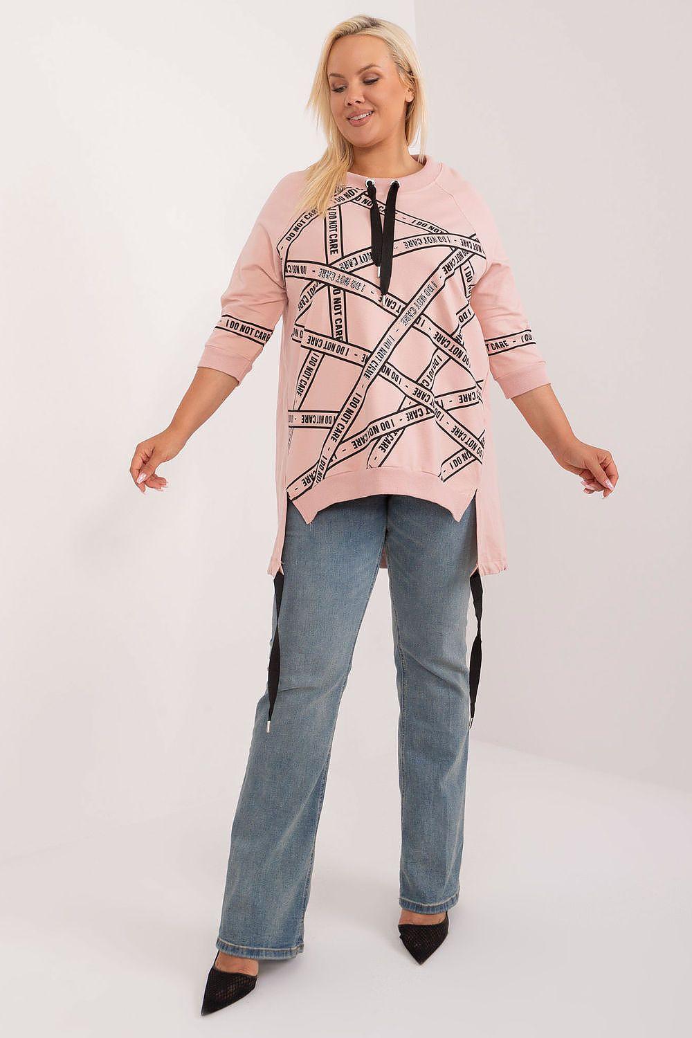 Pink plus-size blouse with asymmetrical hem, graphic print, and 3/4 sleeves