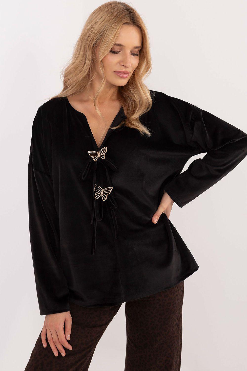 Black velour blouse with V neckline and butterfly appliqué detail
