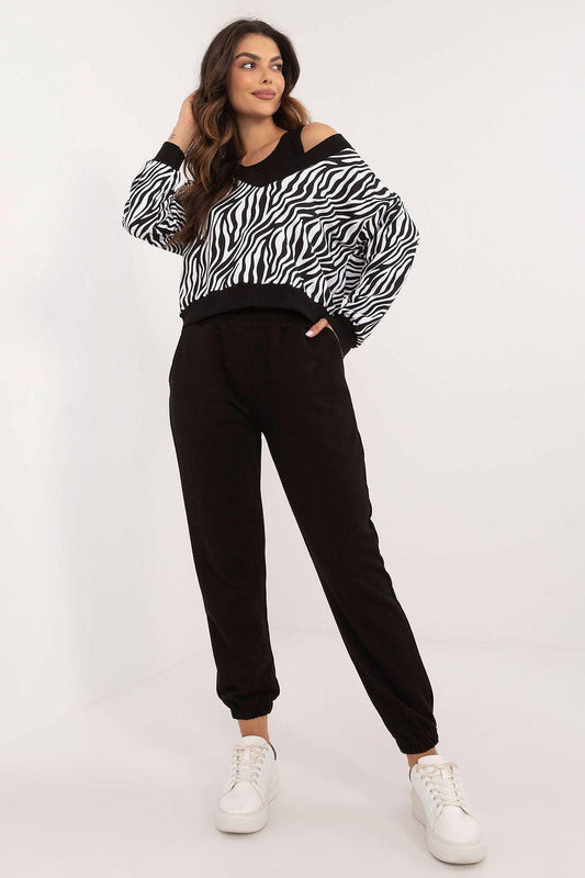 Zebra-print sweatshirt and black jogger pants set, long sleeves, elastic cuffs