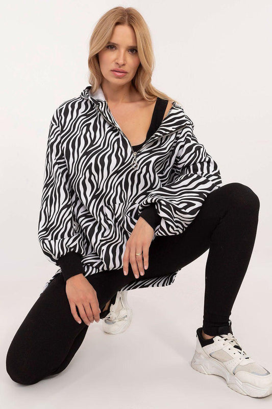 Zebra-print zip hoodie with black leggings, athleisure set
