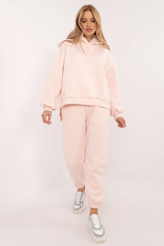 Pink two-piece tracksuit set with hooded sweatshirt and matching jogger pants